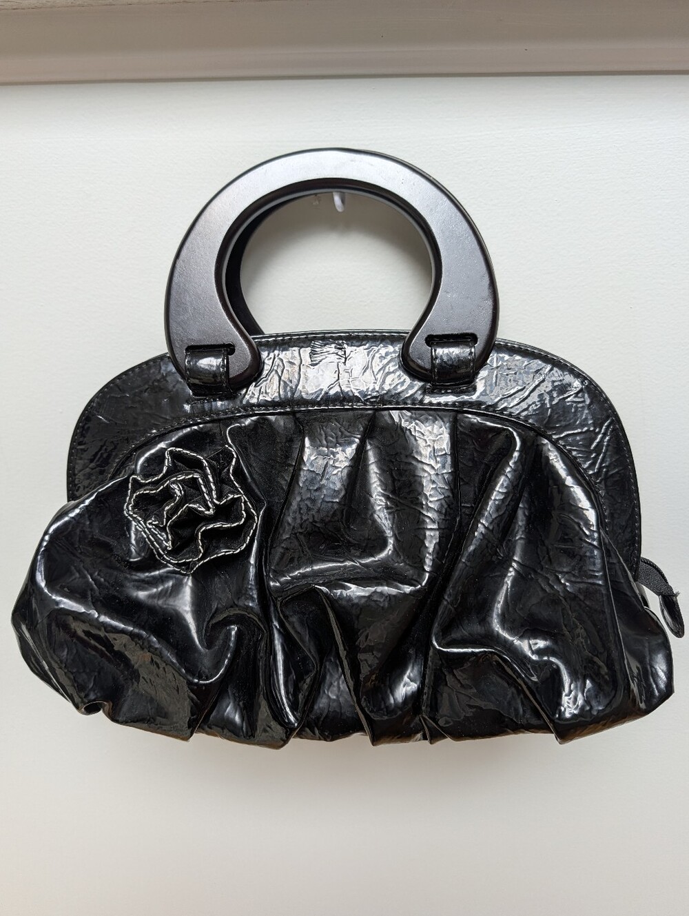 Black Patent Handle Clutch Bag with Rosette Detail